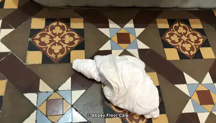 Introduction to Victorian Tile Restoration, Abbey Floor Care restoring the colour to a Victorian clay tile floor using a colour-enhancing impregnating sealer